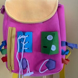 Pink Busy Board backpack - New! We got two as a gift.